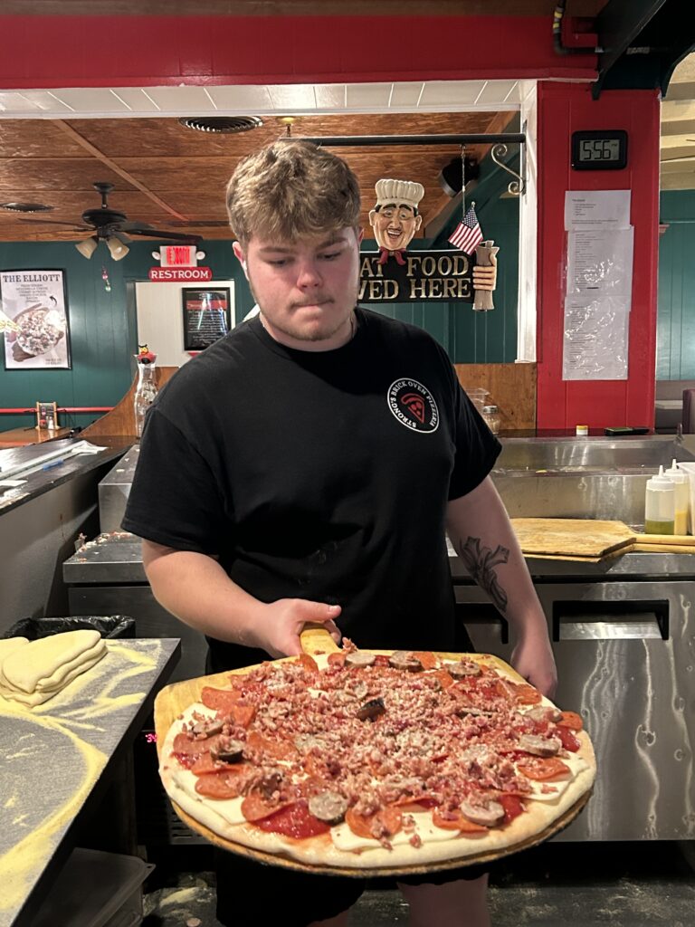 Making pizza at Strong's Brick Oven Pizzeria