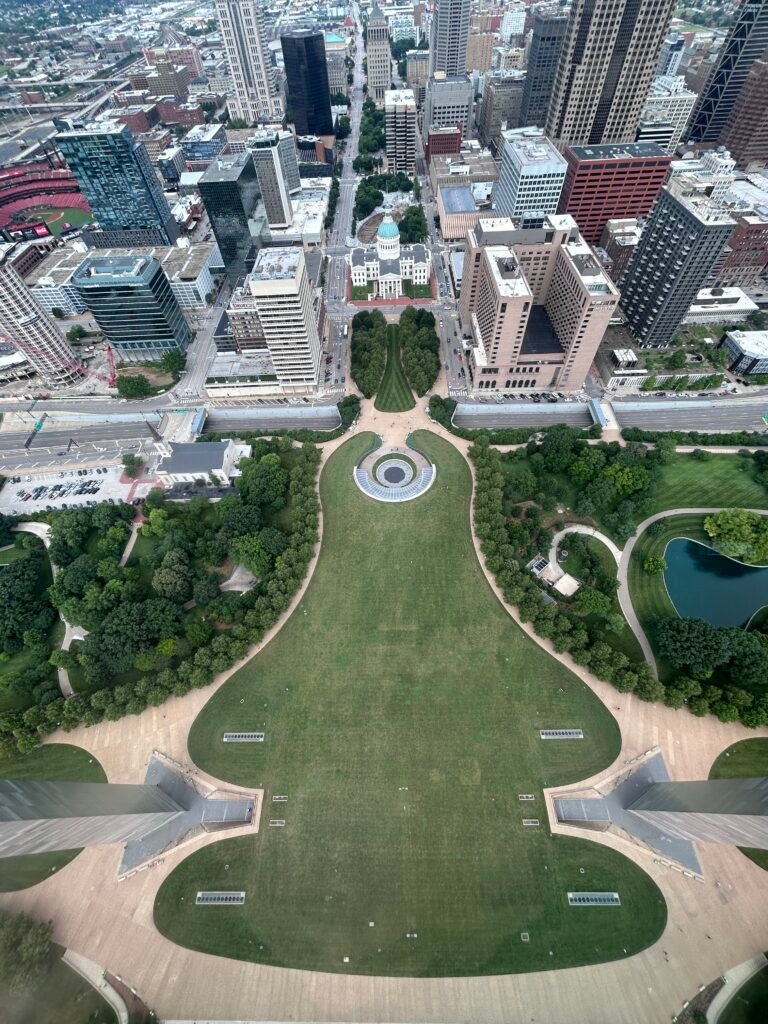 View from the top of the Gateway Arch overlooking the park grounds, Old Courthouse, downtown St. Louis and Busch Stadium