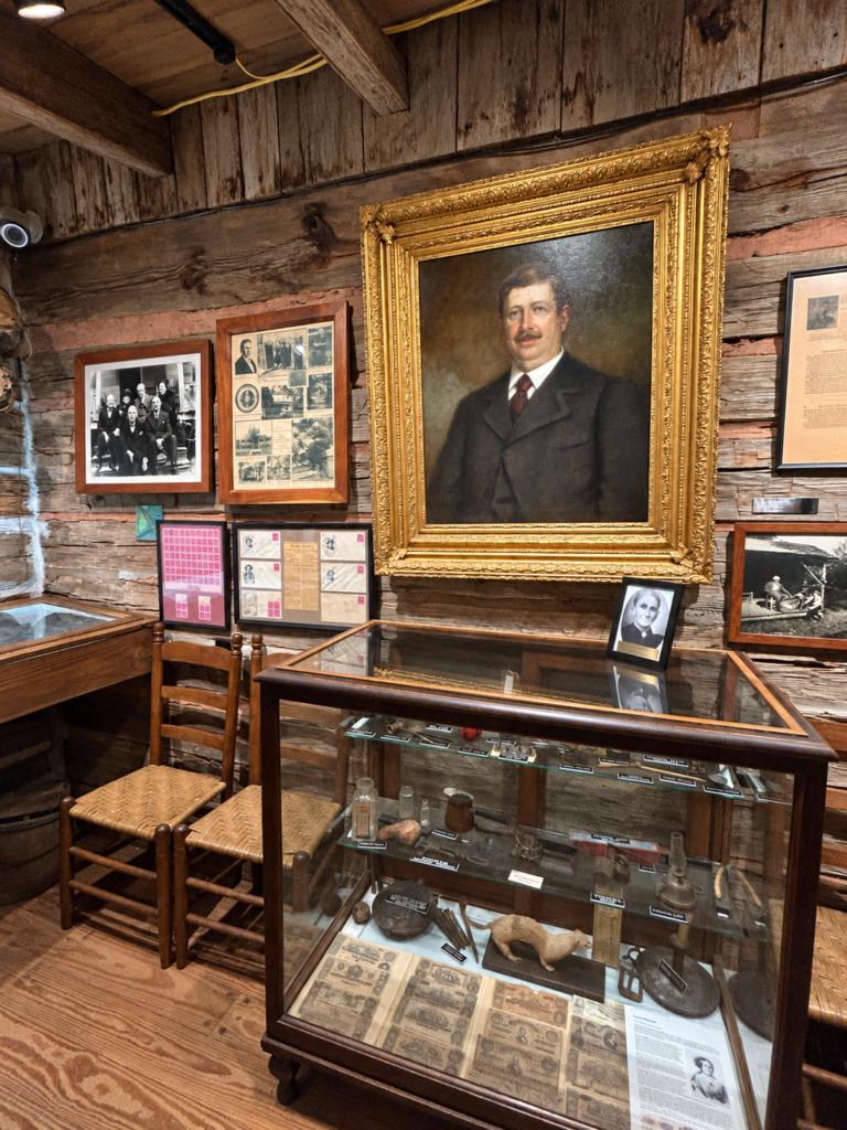 Joel Chandler Harris portrait and historical exhibits inside the Uncle Remus Museum