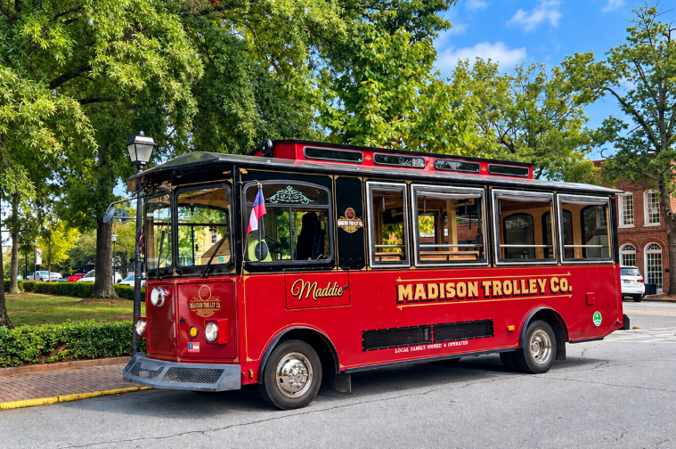 Red Madison Trolley parked on the town square in Madison, Georgia