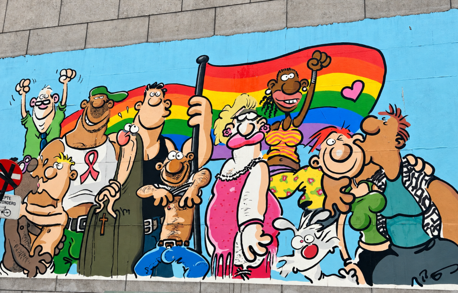 Colorful Brussels cartoon mural featuring illustrated characters and rainbow flags