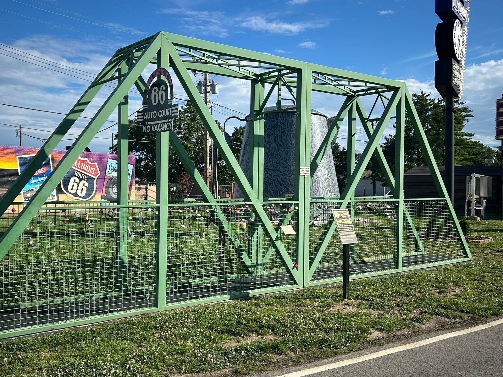 It's Electric Neon Sign Park in Granite City, Illinois, featuring Route 66-themed displays, vintage signs, and roadside attractions